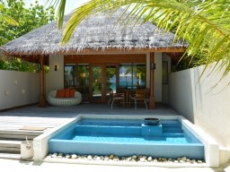 Beach Bungalow - Exterior view of a beach bungalow from the beach with private pool.